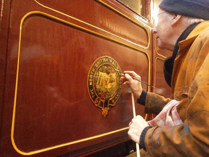 Jim painting the decal