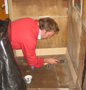 Robbie working on the skirting board